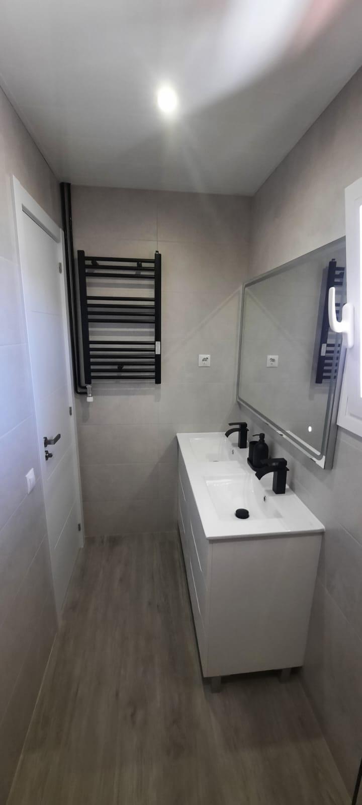 Baño reformado con ducha